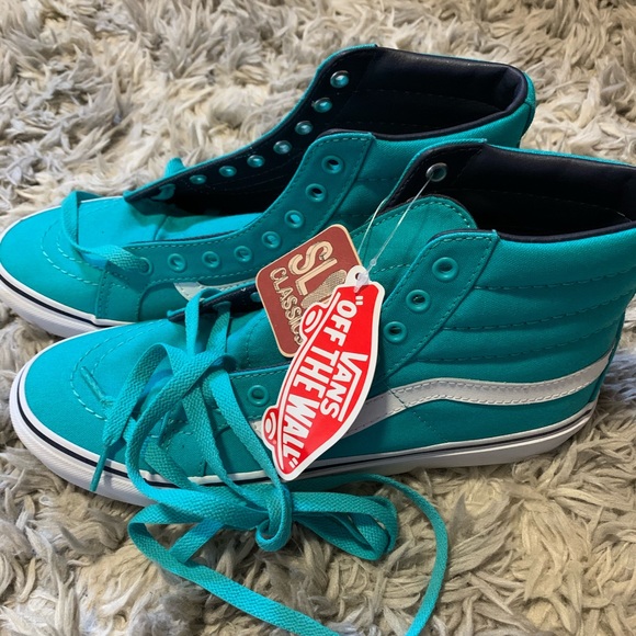 teal high top vans
